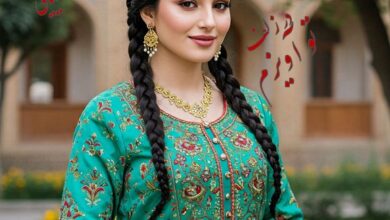 در زلف تو آویزم